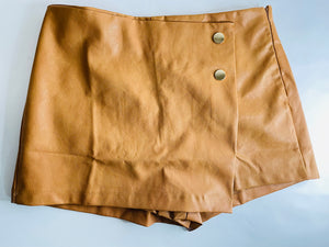 This Standard Button Front Faux Leather Skorts