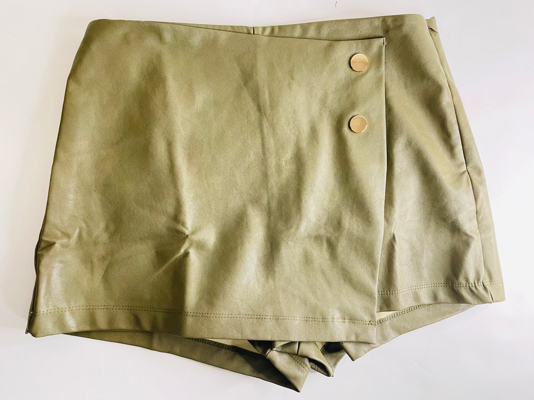This Standard Button Front Faux Leather Skorts