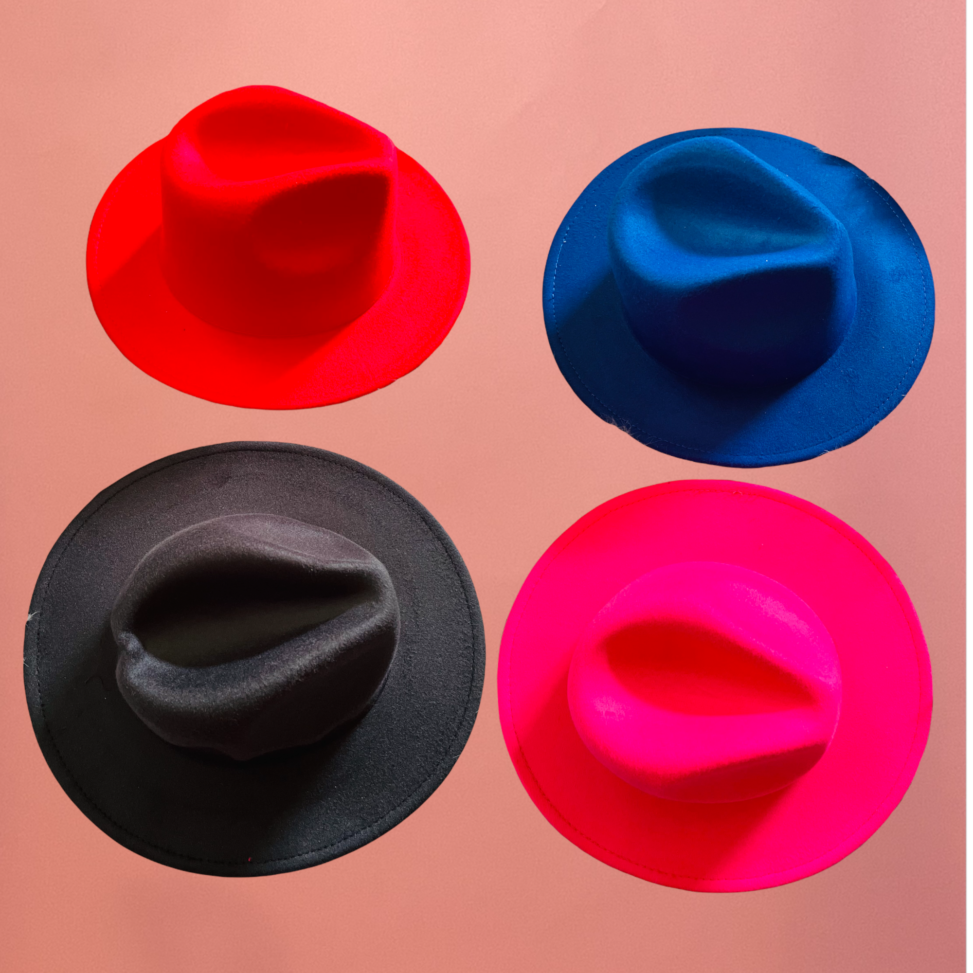 J. ELISE BOUTIQUE Stay on trend and turn heads in our wide brim accent red bottom fedora hats. Elevate any look from simple or basic to effortlessly stylish. Fedora Style Felt Hat with Bottom Accent Material: 65% cotton, 35% polyester Adjustable strap inside Hat Circumference: 56-58cm/22-22.8